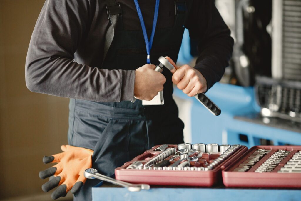 Mechanic assembling a socket wrench tool set